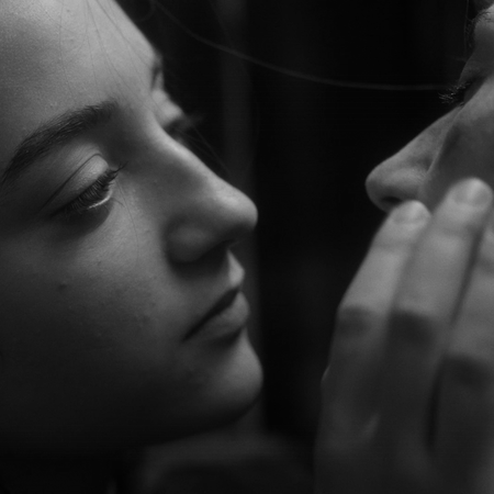 “Two People Exchanging Saliva”